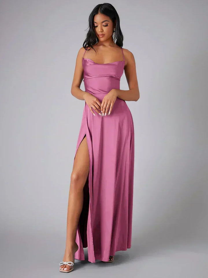 Sophisticated women's evening dress. Full-length gown with a sexy high slit & elegant open-back design.