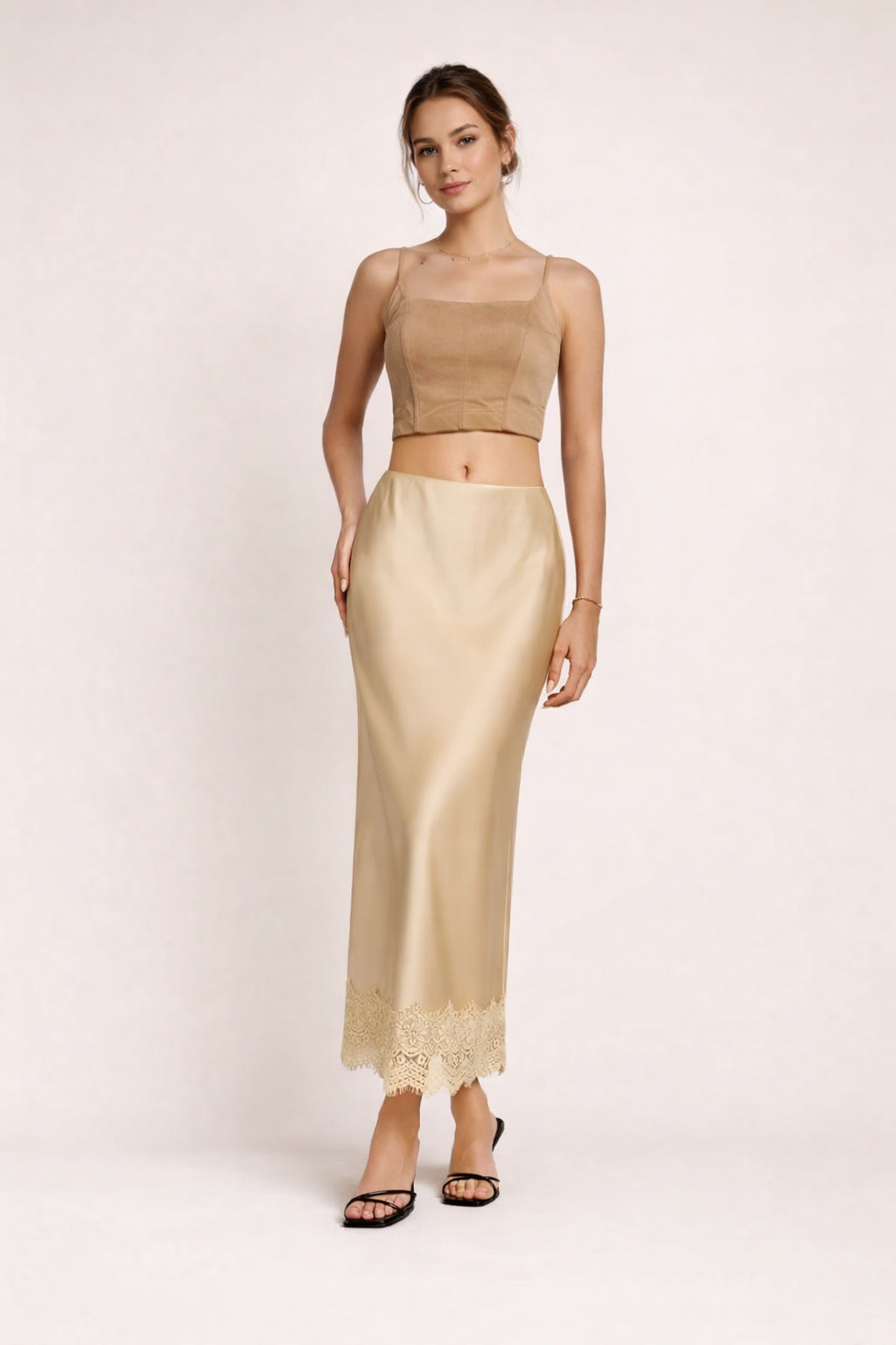 Elegant women's maxi skirt with delicate lace hem, perfect for formal events & evening wear.