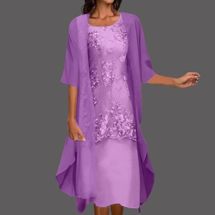 Formal women's elegant midi dress and cardigan set. Stylish two-piece outfit suitable for occasion and party wear.
