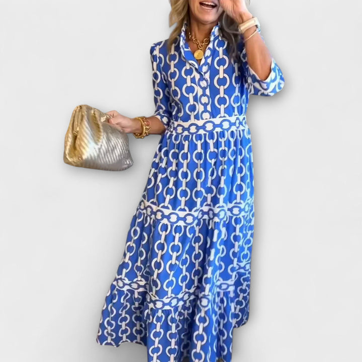 Elegant women's midi dress featuring a sophisticated chain pattern. Perfect for versatile fashion.