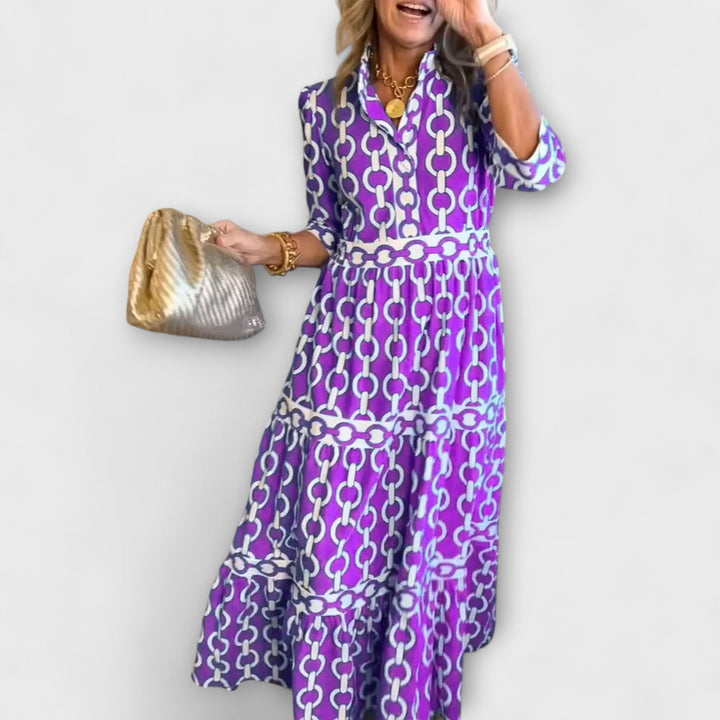 Black midi dress for women with a unique chain pattern, a versatile & comfortable fashion piece.