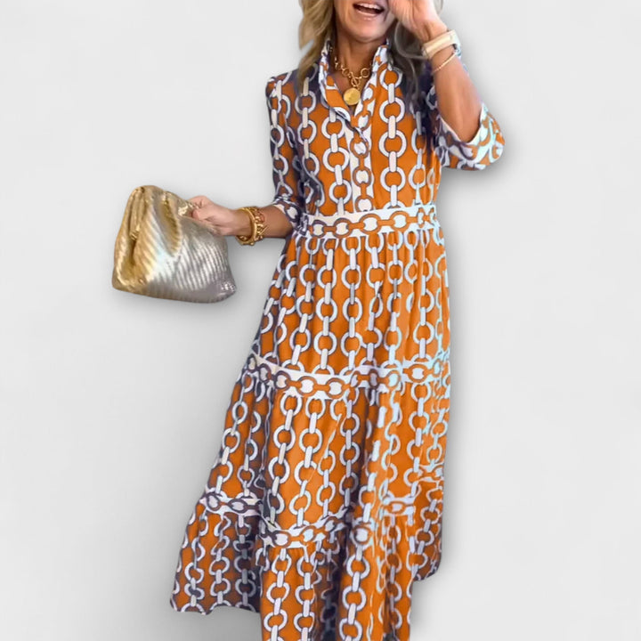 Green women's chain pattern midi dress, stylish and comfortable, perfect for any occasion.