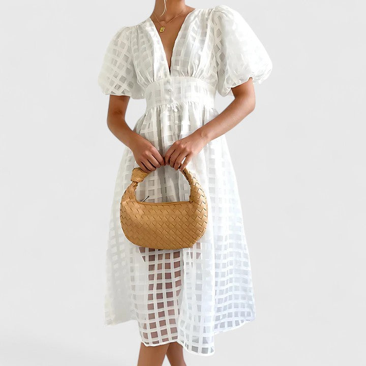 Chic women's midi dress, ideal for wedding guests & party events. Versatile elegant style for summer.
