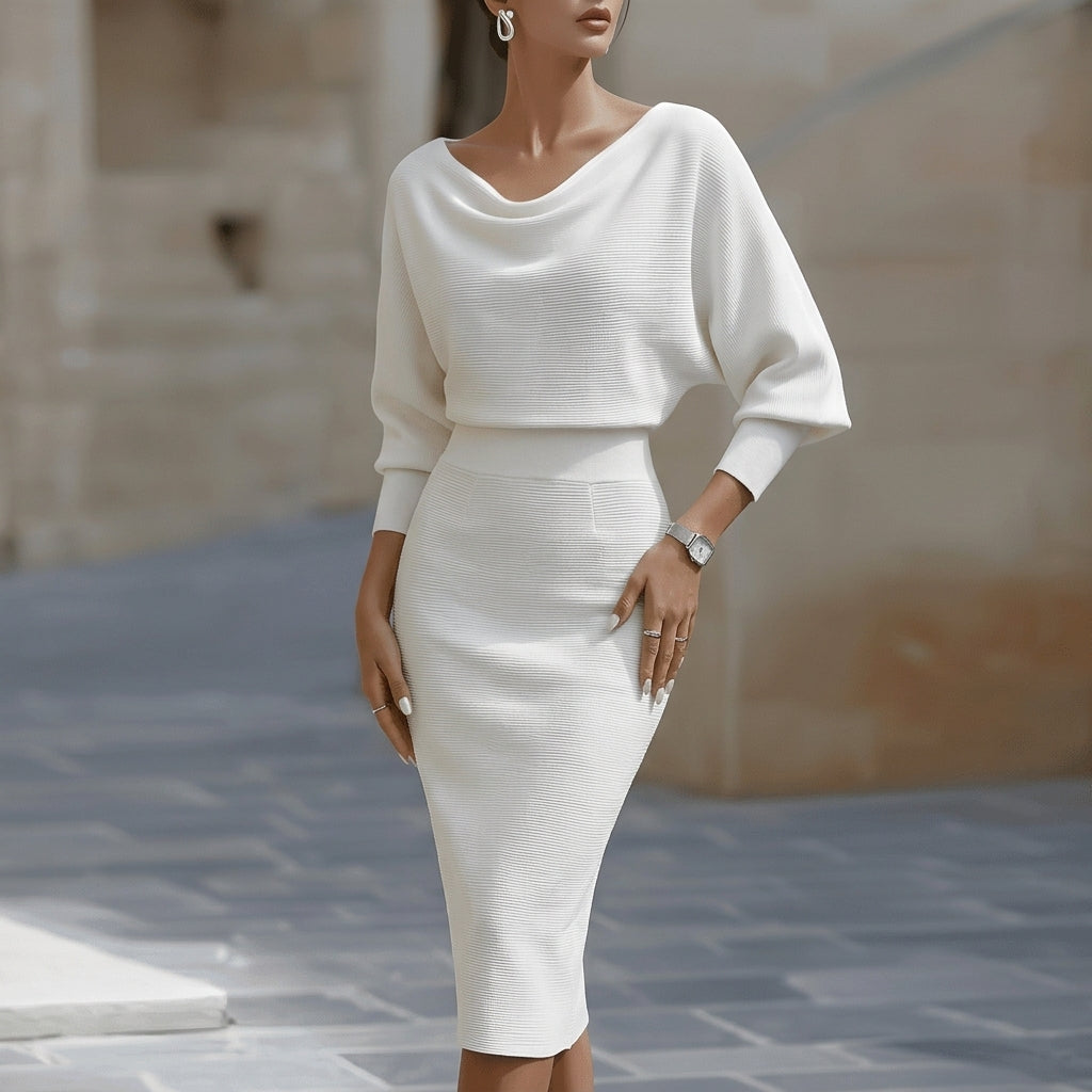 Elegant women's midi dress with adjustable spaghetti straps, perfect for formal or party occasions.