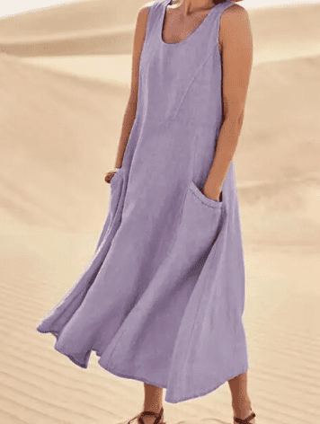 Comfortable loose-fit women's midi dress with pockets, offering elegant style for summer & spring outings.