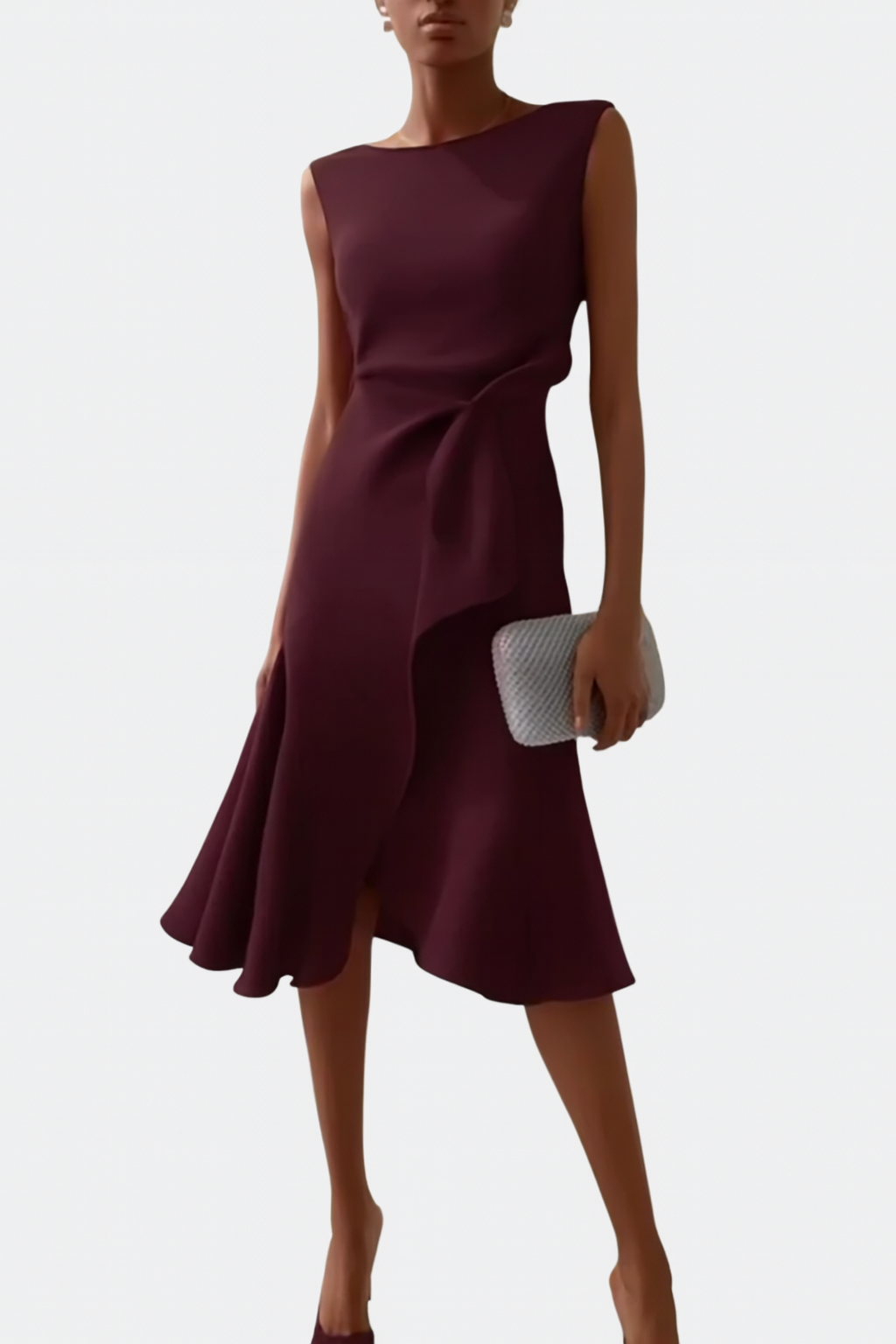 Women's sleeveless midi dress with a round neck, ruffle hem, and elegant wrap detail for parties.