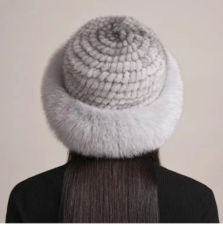 Luxurious women's genuine fur hat, crafted from soft mink and fluffy fox fur for winter