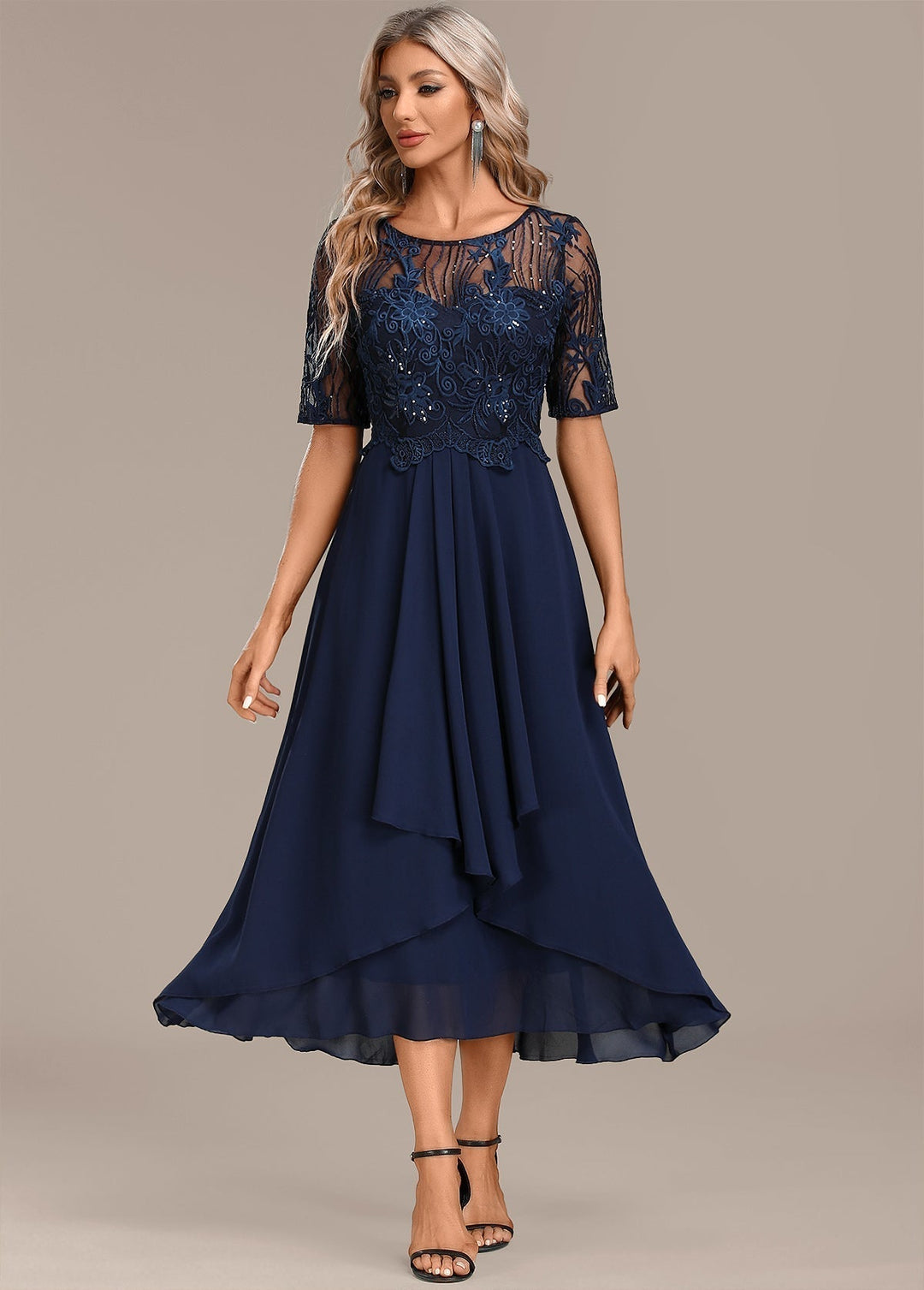 Elegant women's navy midi dress with delicate lace paneling, round neck, and short sleeves, perfect for parties.
