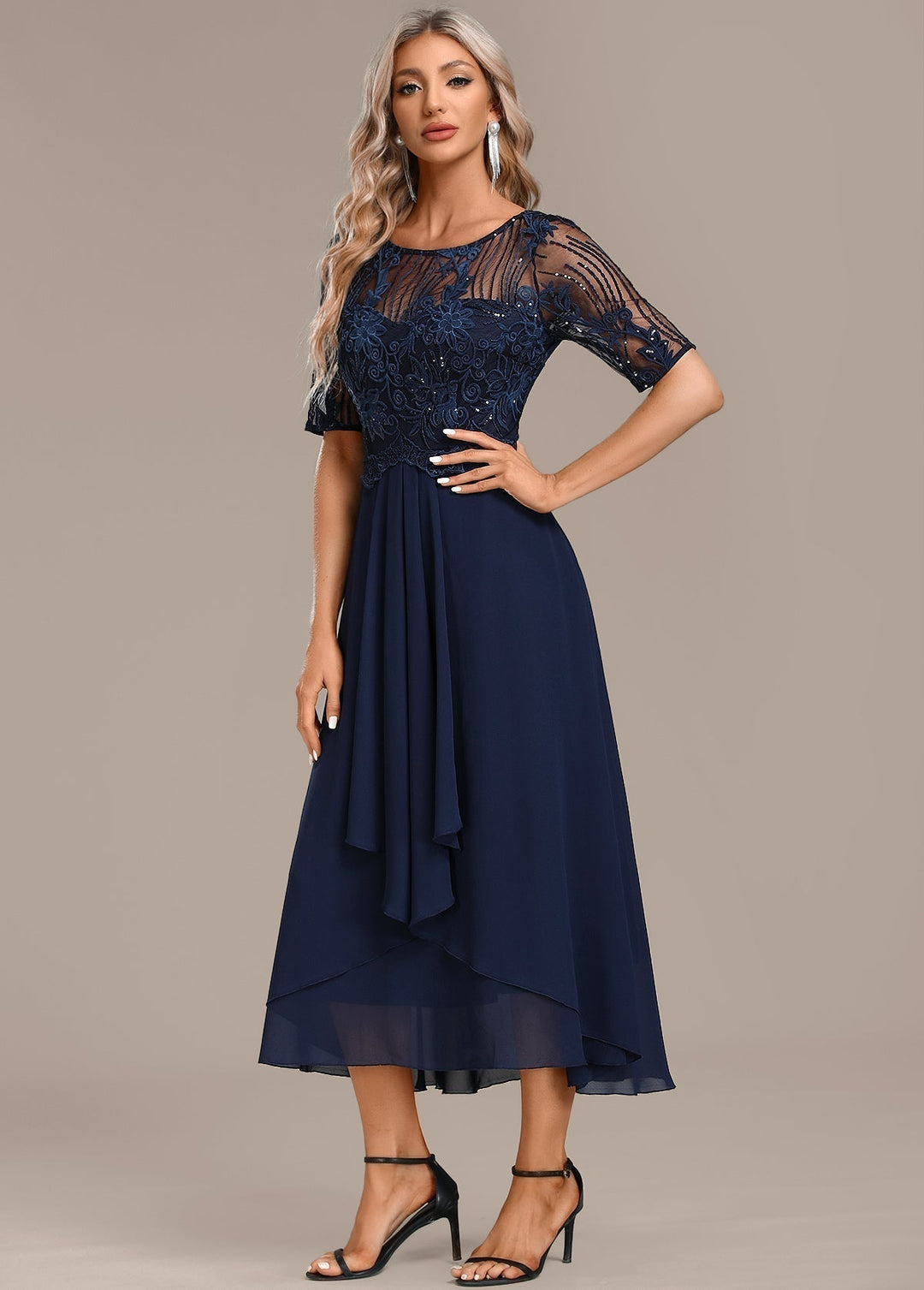 Stylish women's navy midi dress with intricate lace panel details, a round neck, and short sleeves for elegance.
