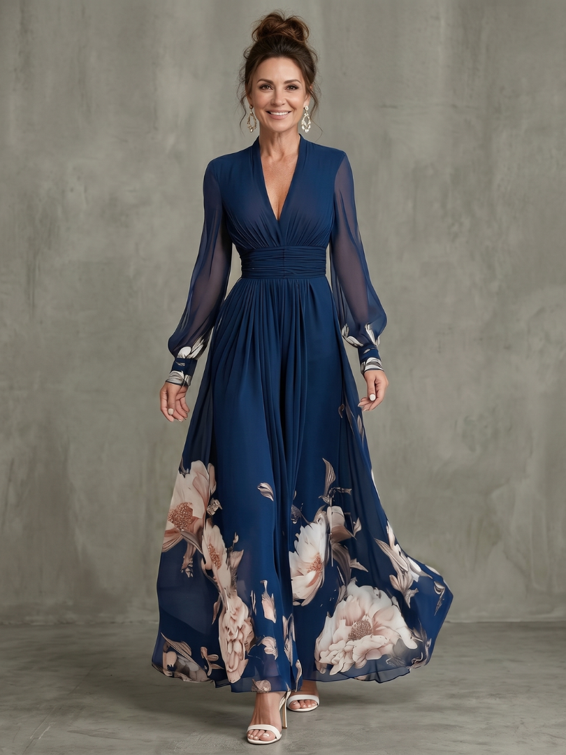 Elegant women's navy V-neck pleated maxi dress with sheer long sleeves, ideal for formal events.