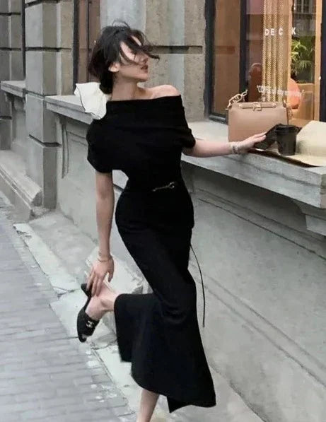 Stylish long off-shoulder bodycon dress for women, ideal as a party or cocktail dress.