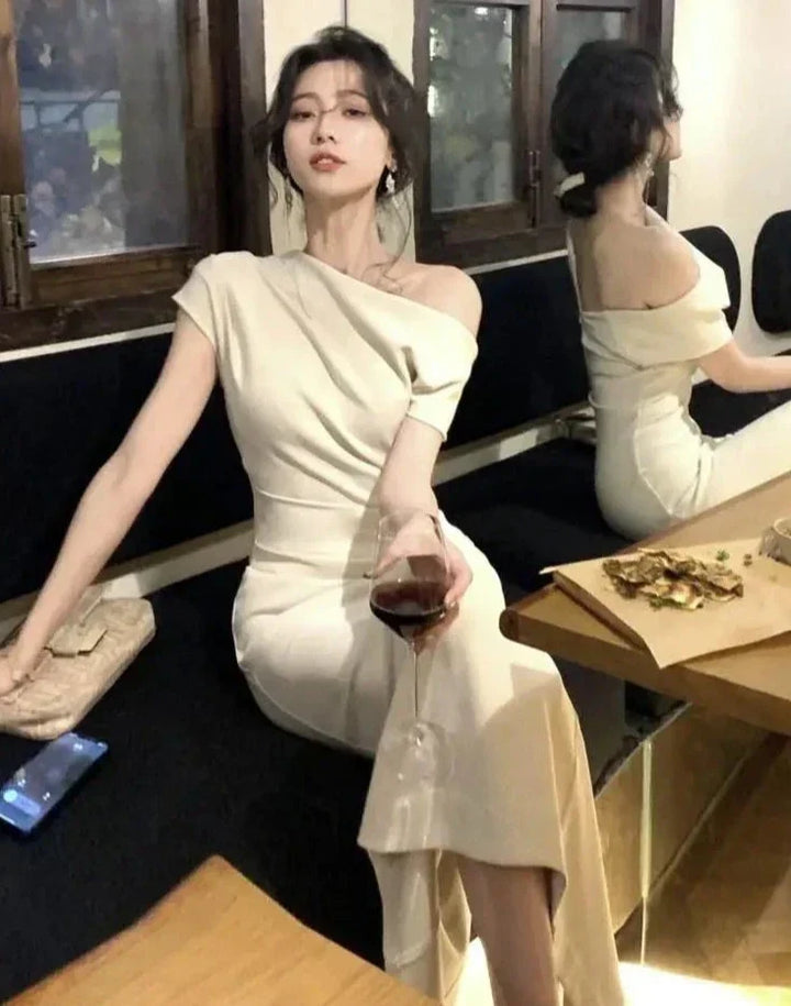 Sophisticated off-shoulder bodycon maxi dress for women, a stunning elegant evening gown.