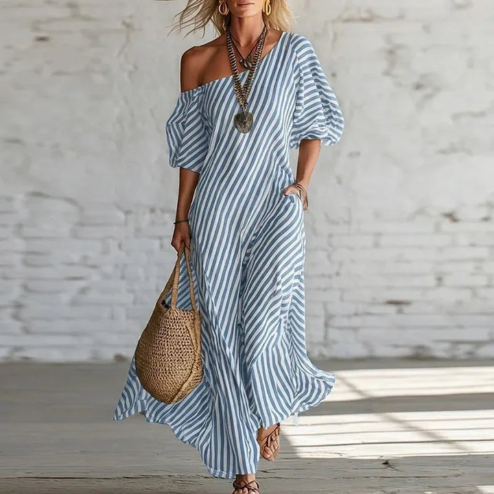 Elegant striped one-shoulder puff sleeve midi dress for women. Stylish & flowy, great for summer fashion.