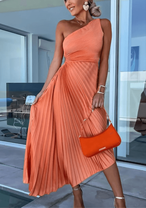 Elegant women's one shoulder pleated maxi dress in a luxurious fabric, perfect for evening events.