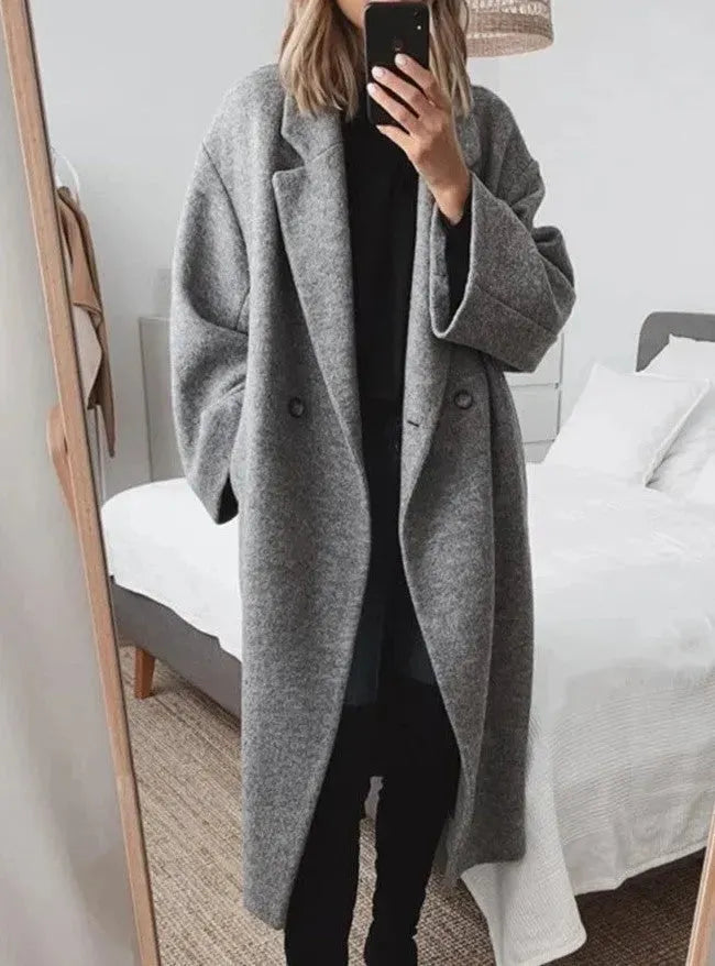 Elegant women's oversized button-down winter coat in classic style, perfect for fall fashion outerwear