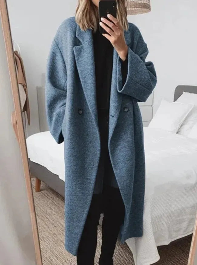 Stylish long oversized button-down coat for women, an elegant outerwear piece for cold weather