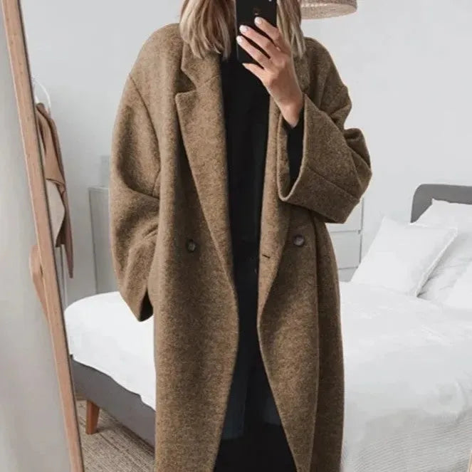 Women's sophisticated oversized winter coat with button-down front, ideal for elegant fall fashion