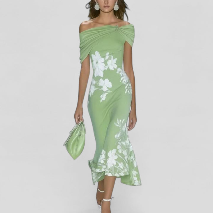Elegant women's patterned midi dress, flattering flowy design, comfortable for summer parties & special occasions.