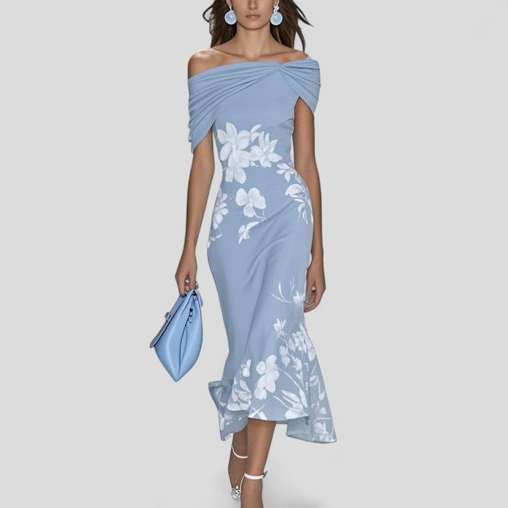 Chic women's midi dress with unique print, flattering silhouette, perfect for casual wear or elegant events.