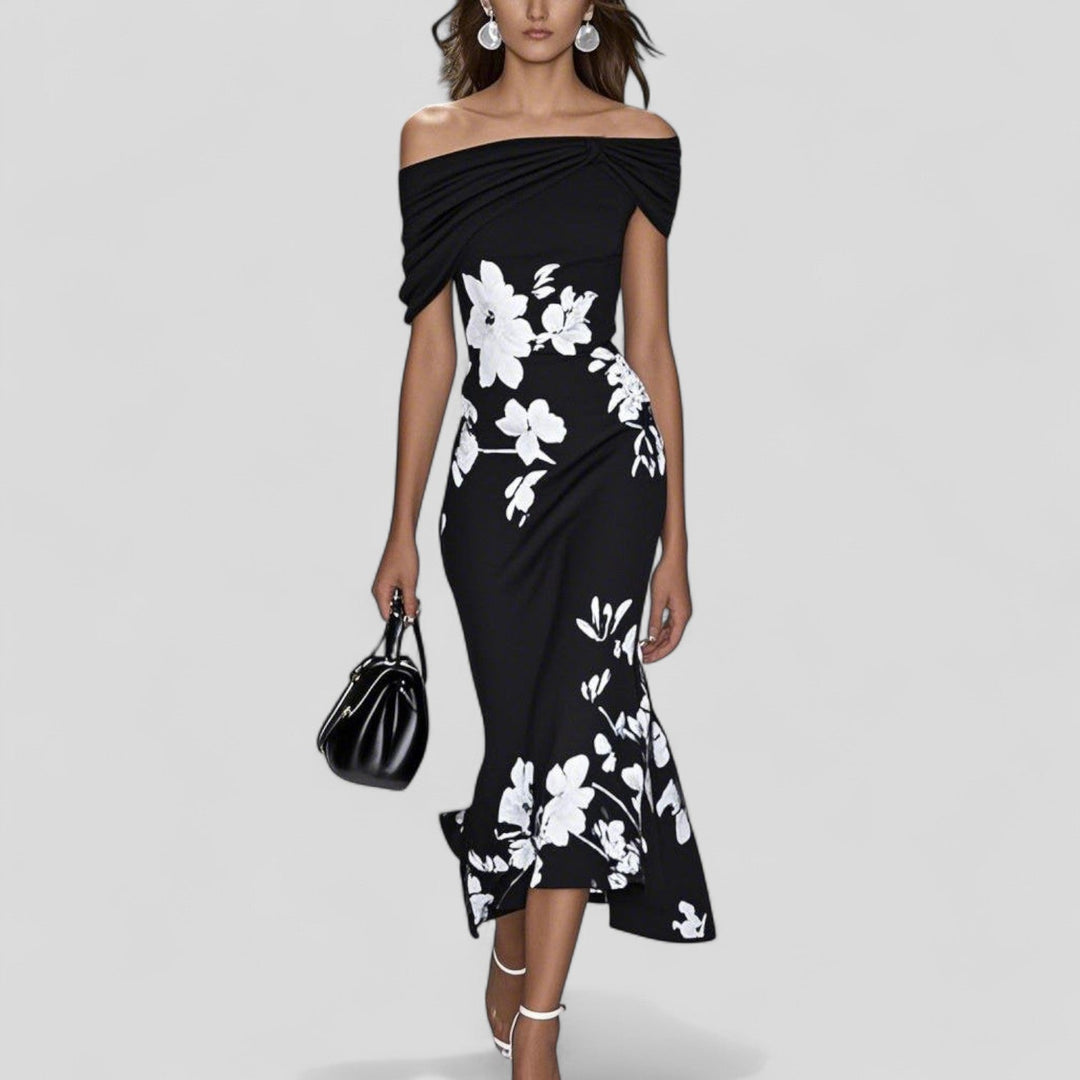 Comfortable women's patterned midi dress, elegant and flowy, ideal for summer, parties, or everyday chic.