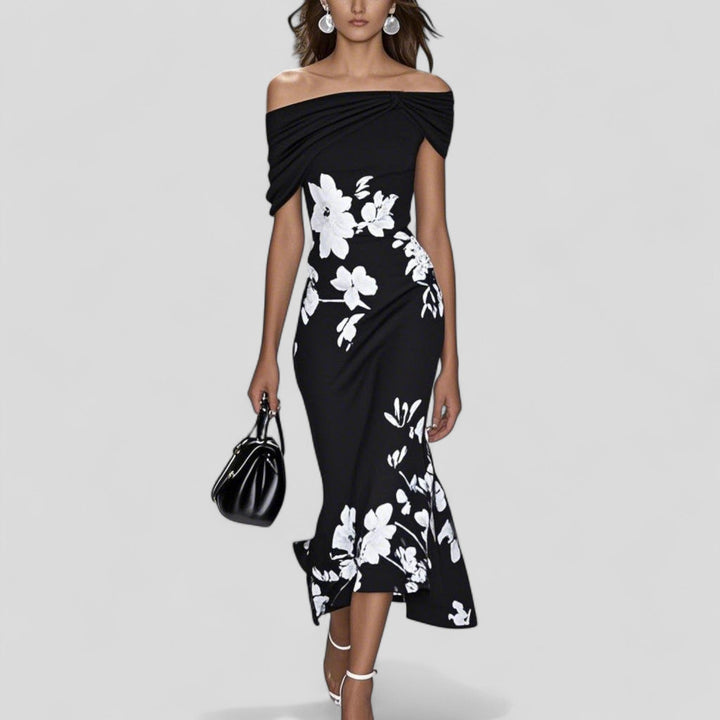 Comfortable women's patterned midi dress, elegant and flowy, ideal for summer, parties, or everyday chic.