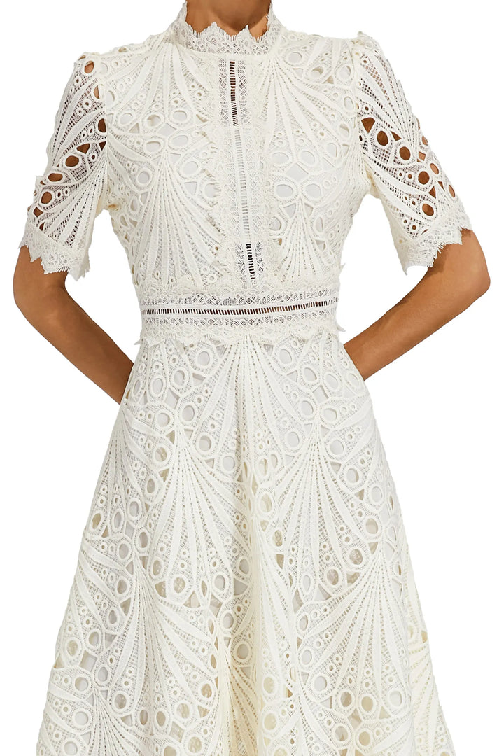 Fashionable pink lace midi dress, a must-have for women seeking chic occasion wear.