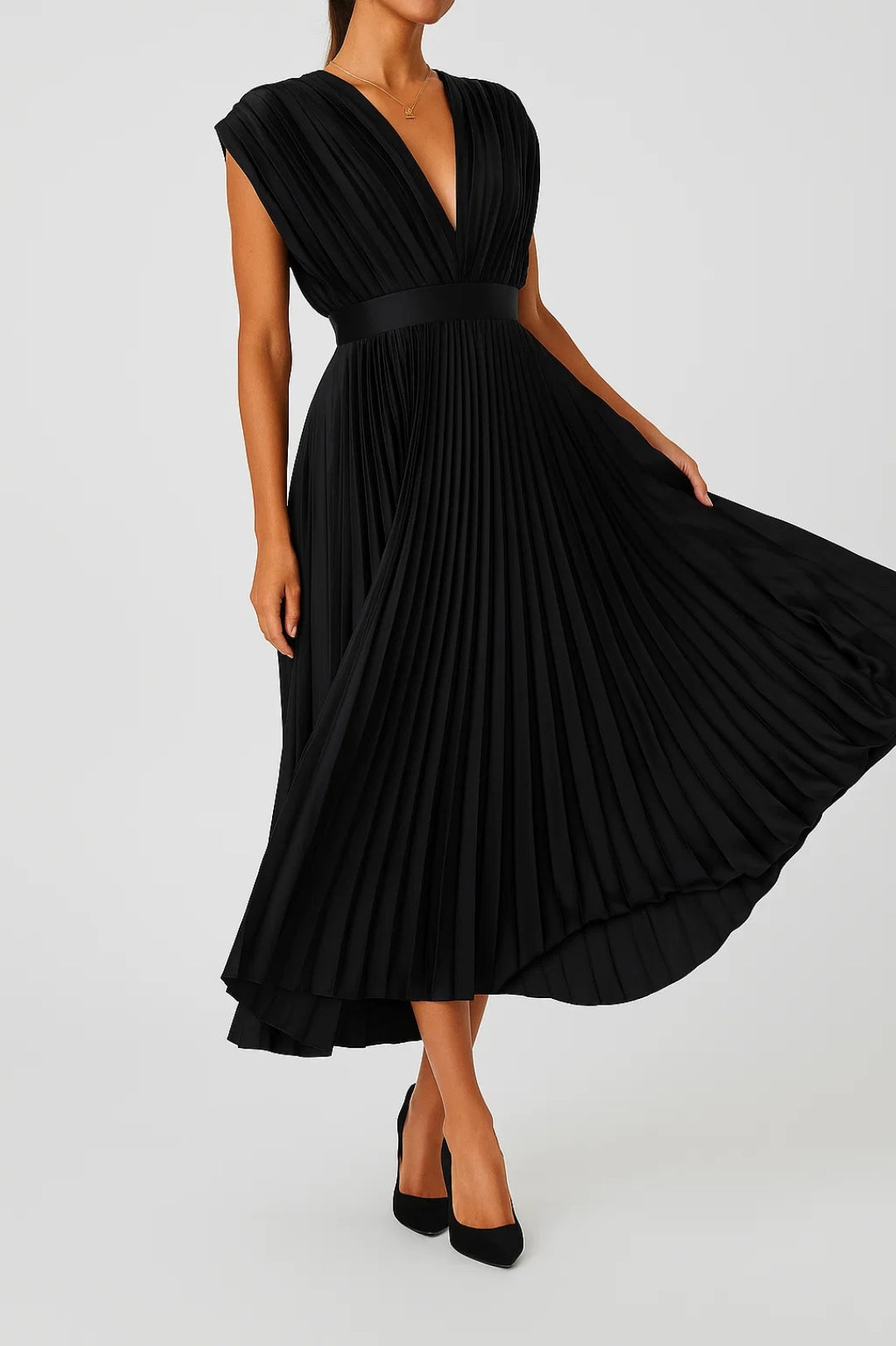 Chic women's deep V-neck pleated midi dress for elegant evening wear. Ideal formal or cocktail party attire.