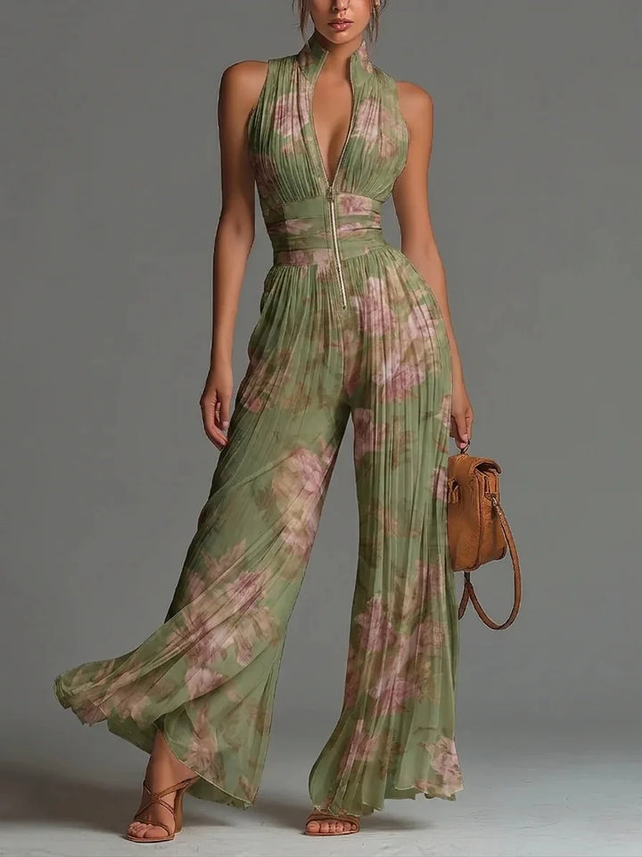 Elegant women's pleated floral halter jumpsuit with wide leg. Perfect for summer parties, vacation, or special occasions.