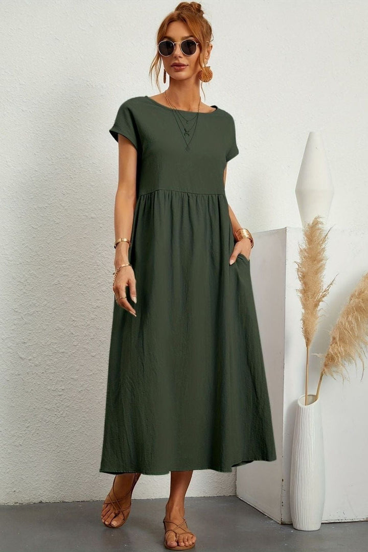 Elegant women's pleated midi dress for effortless style. Perfect for various occasions.