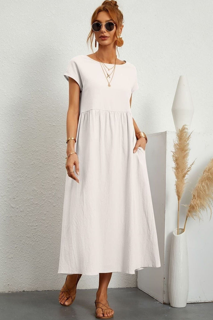 Stunning women's pleated midi dress, offering elegant and effortless party style.