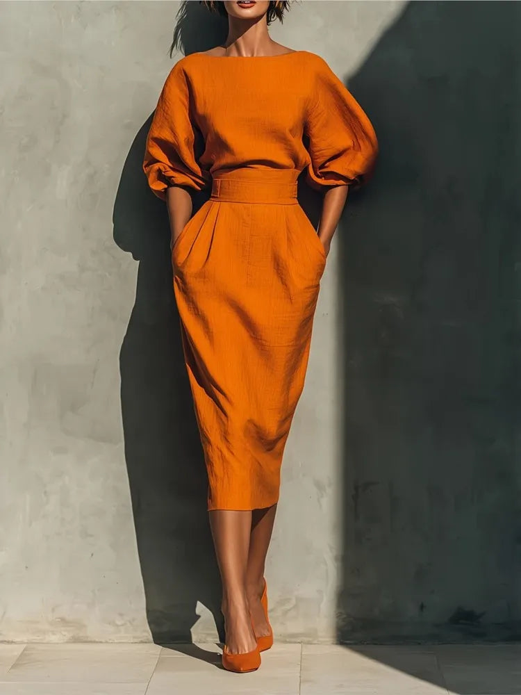 Elegant women's pleated midi dress with stylish lantern sleeves & cinched waist, perfect for spring/summer occasions.