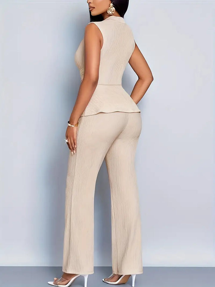 Casual yet elegant women's two-piece set with a pleated peplum top and complementary pants for versatile wear.