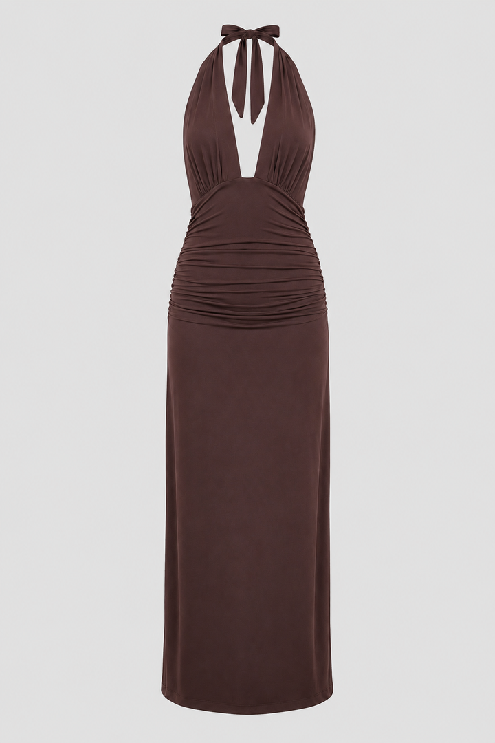 Sophisticated women's open-back evening gown, a long halter dress with a deep plunge front.