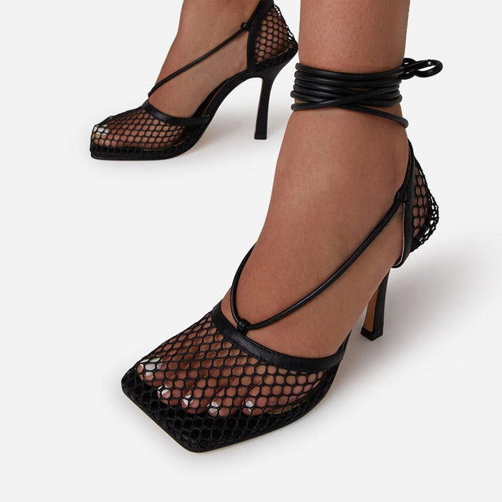 Versatile women's pointed-toe lace pumps, ideal for dressy events, evening wear, or the office.
