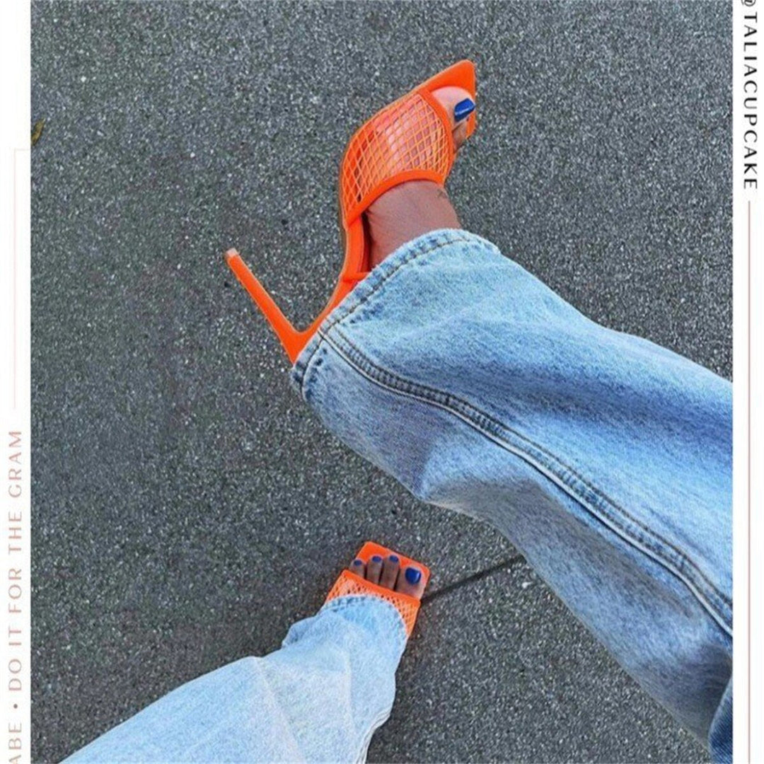 Elegant women's dress pumps with a lace finish and comfortable block heel for any special occasion.