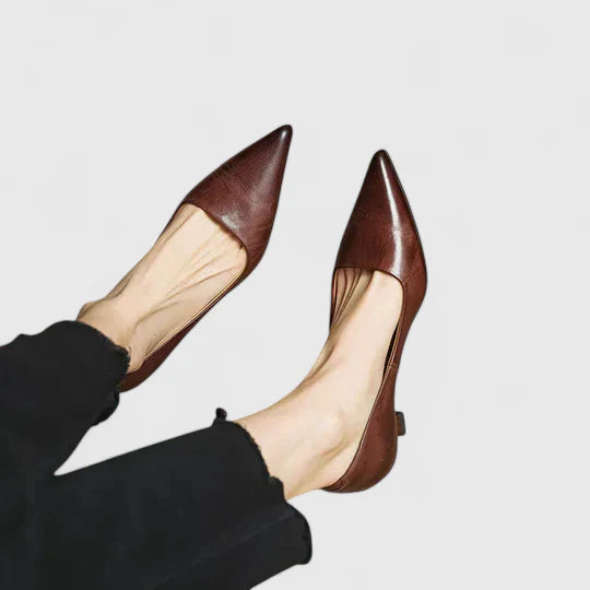 Versatile women's low kitten heel dress shoes with pointed toe, ideal for elegant office or evening events.