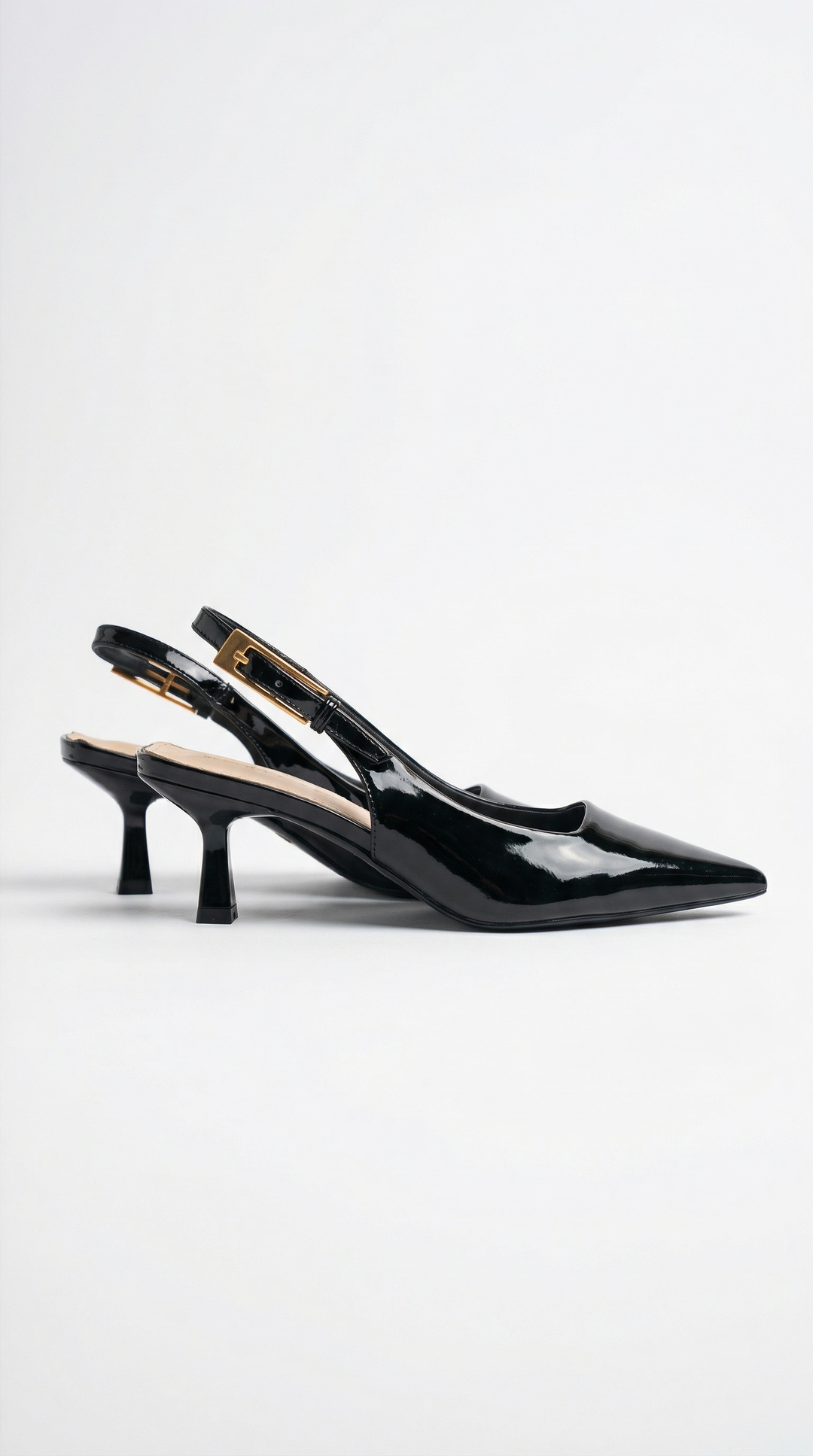 Chic black pointed toe kitten heel slingback pumps for women, versatile formal & evening fashion heels.