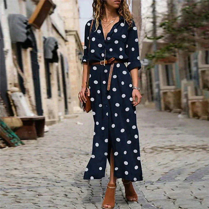 Chic women's polka dot long sleeve maxi dress with a flattering button-down V-neck shirt style. Flowy and elegant.