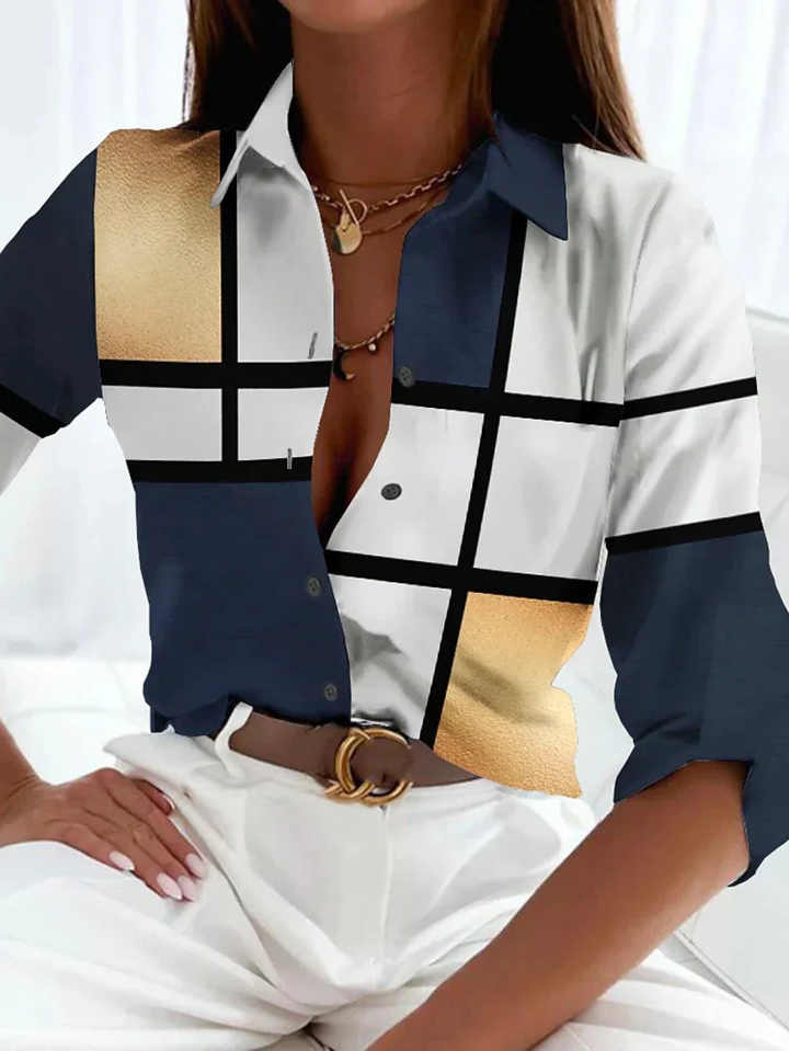 Elegant women's printed button-down blouse with three-quarter sleeves, perfect for office or casual chic style.