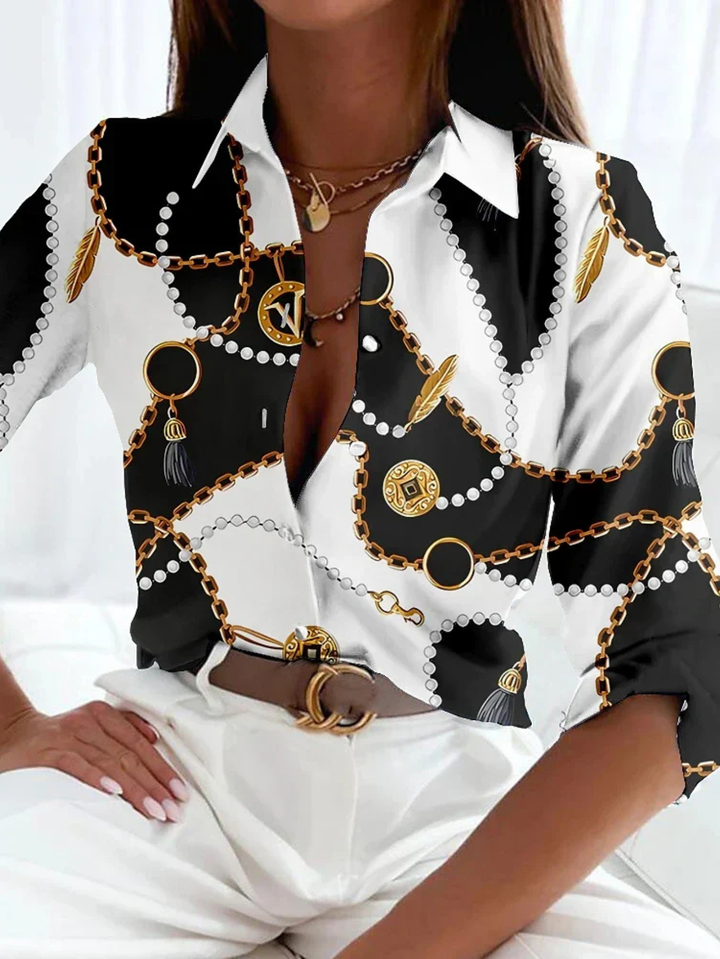 Chic white printed button-down blouse for women, a stylish three-quarter sleeve top for office or casual wear.
