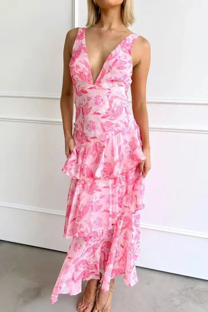 Stylish women's tiered maxi dress, printed, V-neck, ruffle sleeves, ideal for special occasions.