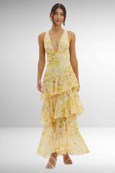 Formal elegant women's printed maxi dress, V-neck, ruffle sleeves, flowy, ideal for special occasions.