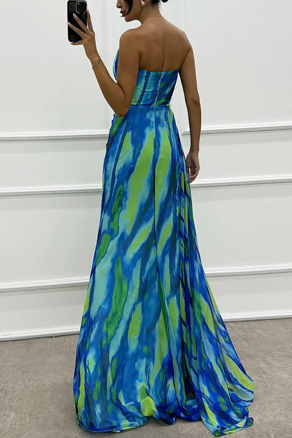 Luxurious printed maxi evening gown for women, with a graceful slit, perfect for special occasions.