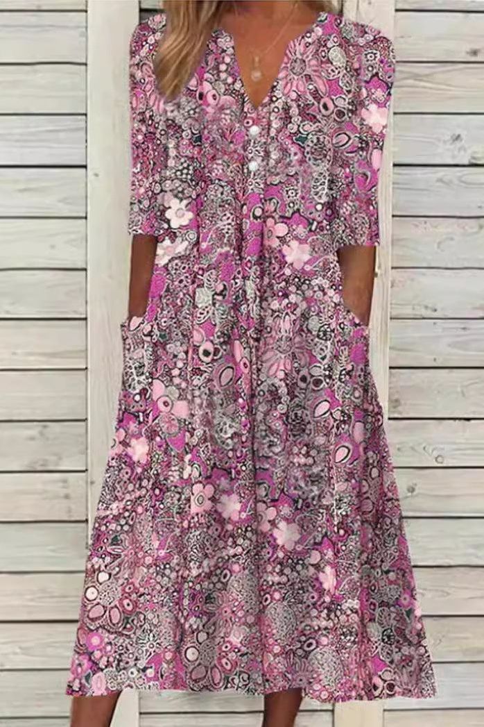 Comfortable women's elegant printed midi dress, ideal for effortless everyday wear or special events.