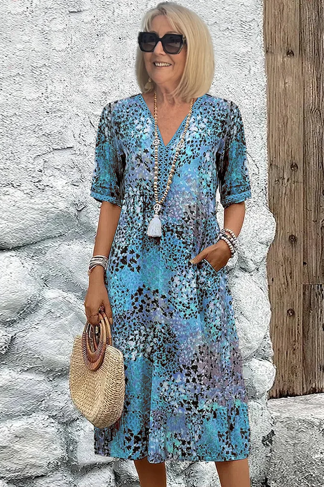 Comfortable & flattering women's printed midi dress, ideal for versatile casual chic or party wear.