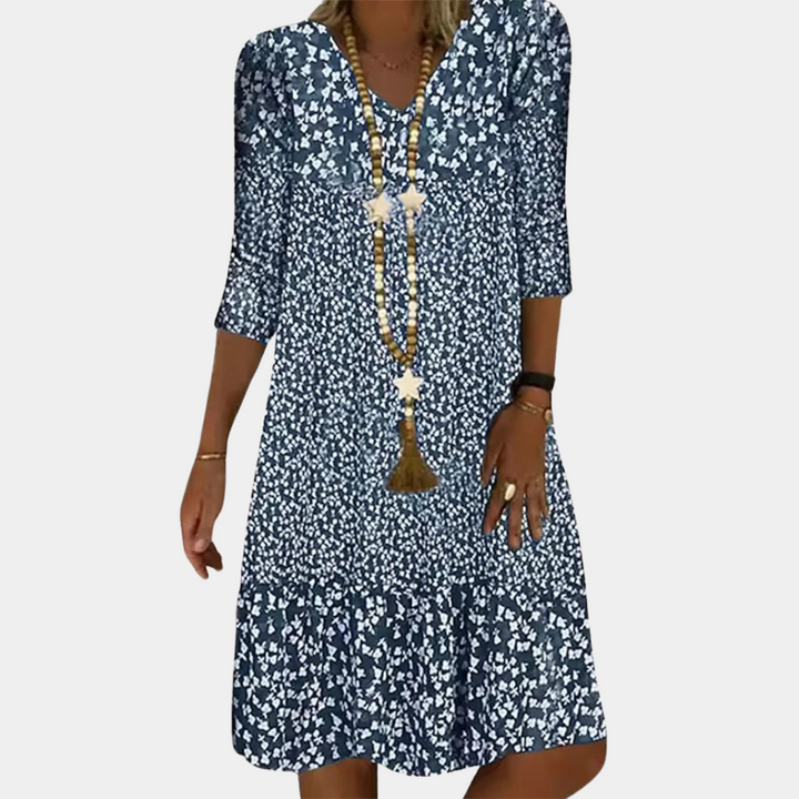 New women's printed midi dress, comfortable and elegant for spring & summer. V-neck A-line design.