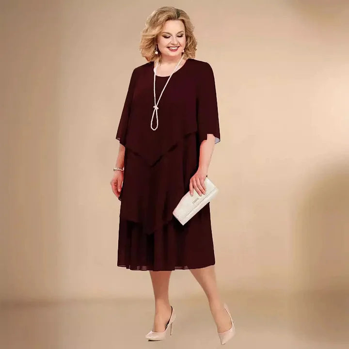 Elegant women's red A-line midi dress with 3/4 sleeves & round neck. Flattering, comfortable party or occasion wear.