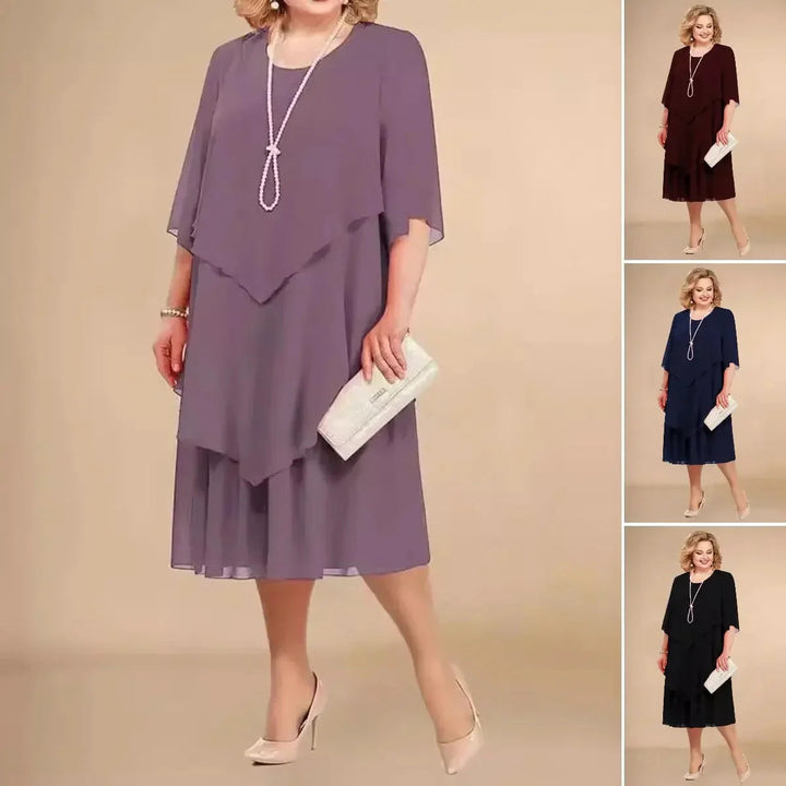 Sophisticated women's A-line midi dress. Elegant 3/4 sleeve, round neck. Perfect as a party or formal occasion dress.