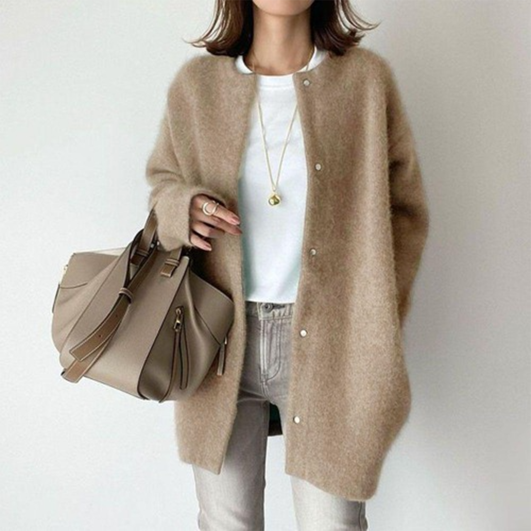 Elegant women's relaxed fit warm winter cardigan in light grey, perfect for cozy layering.