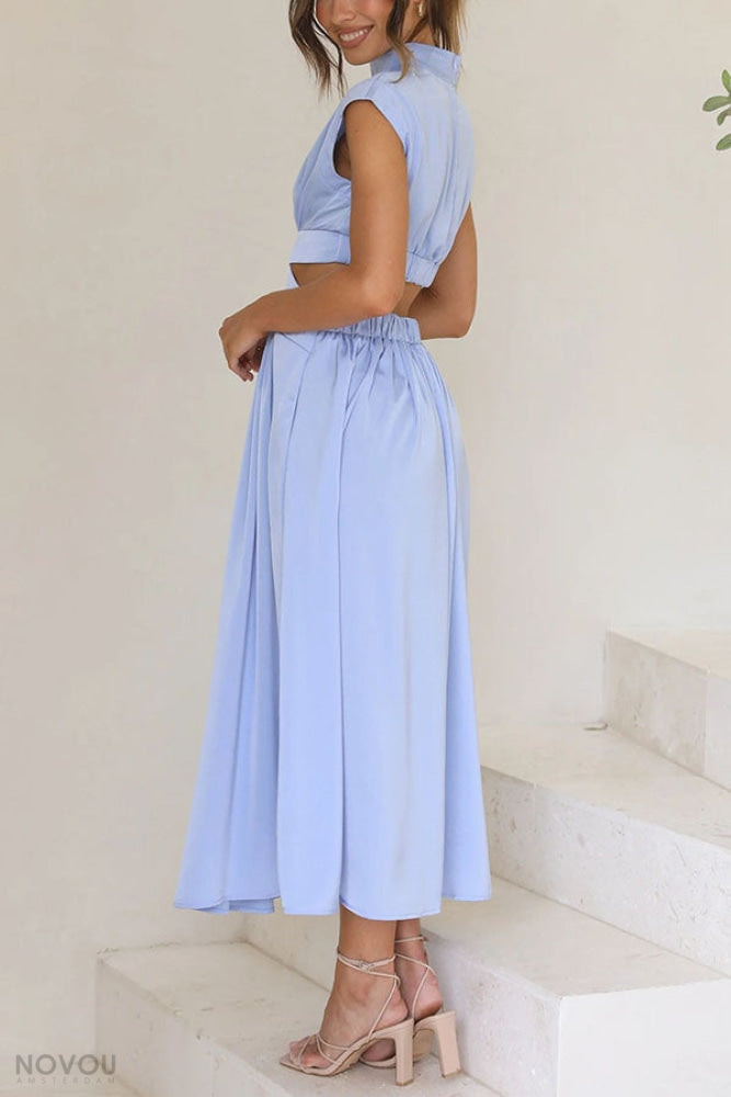 Back view: Women's elegant sleeveless midi dress, roll neck and stylish waist cut-out design.